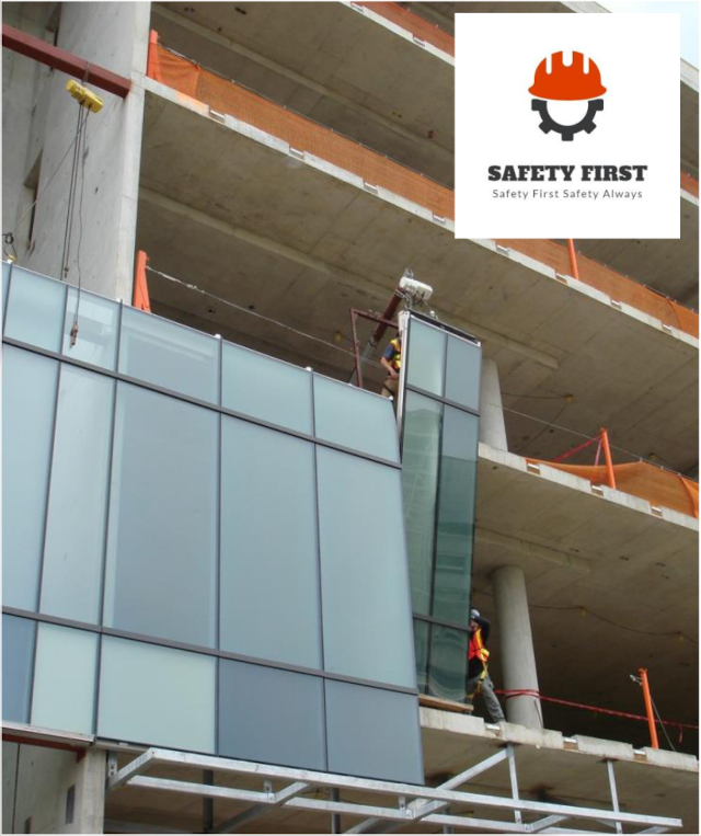 windows being installed in new building, safety first logo on top right